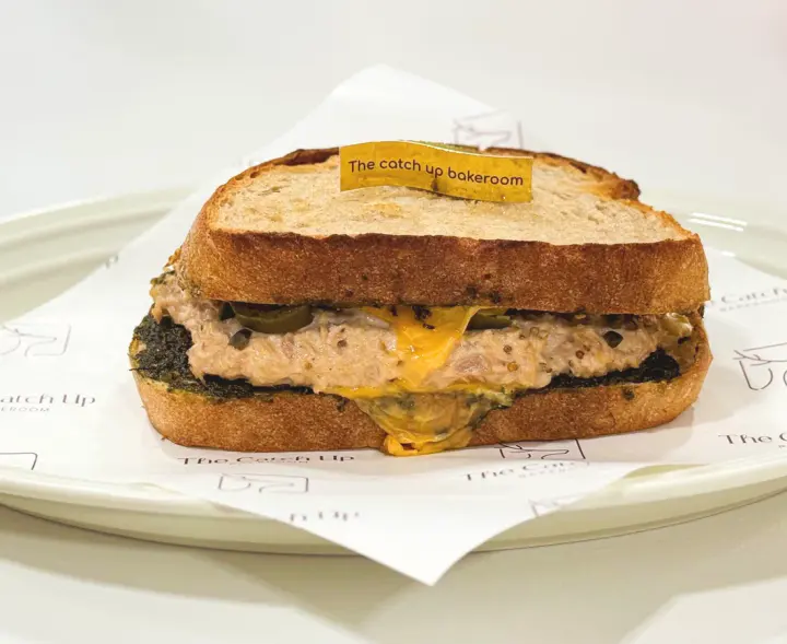 Tuna Melt sourdough sandwich with melted cheese at The Catch Up Bakeroom